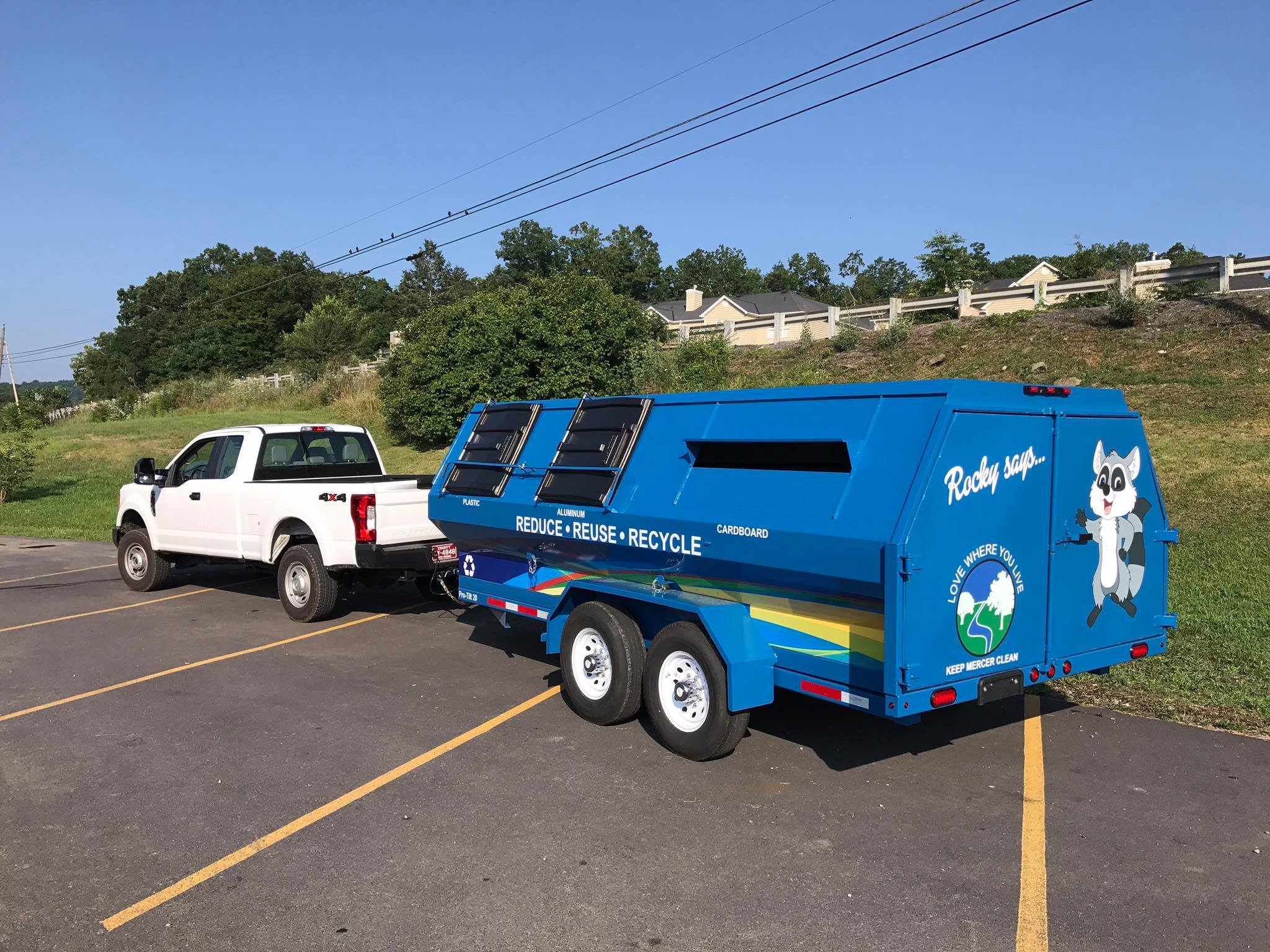 The Keep Mercer Clean recycling trailer in a parking lot.