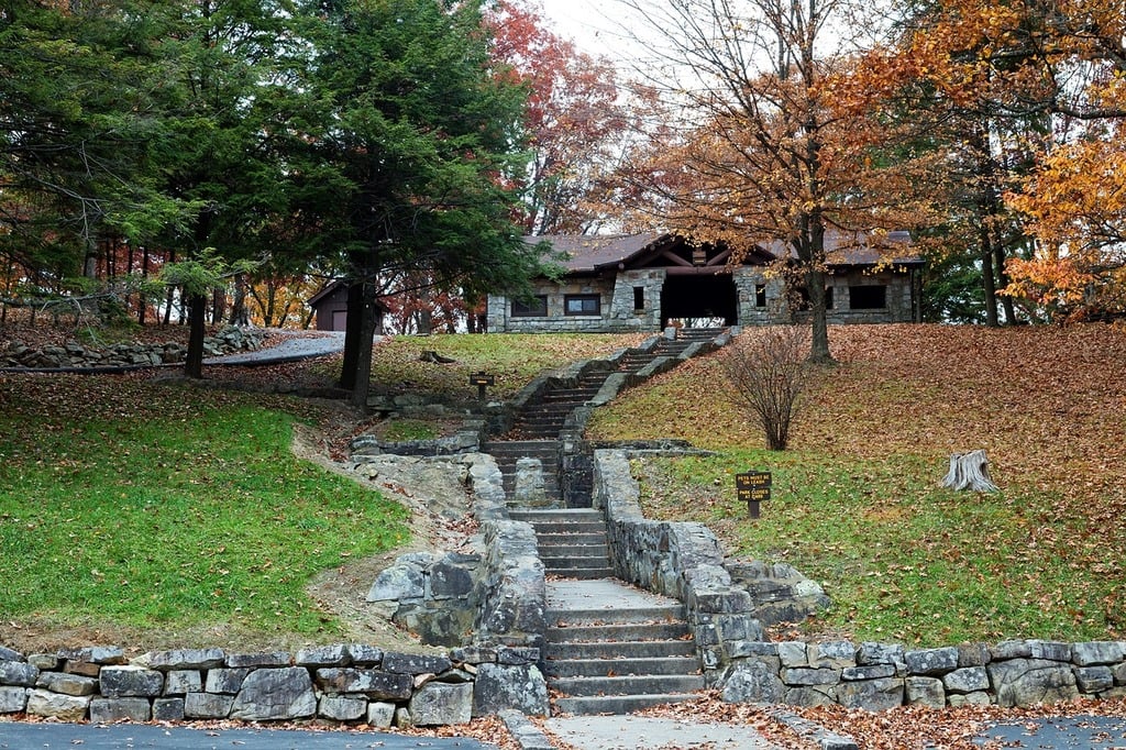 Long stone stair leading up to a stone building at a Mercer County State Park in the fall.